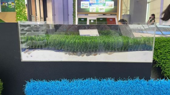 Grama artificial não revestida com estofado absorvente de choques para campos desportivos