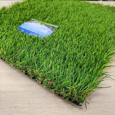 Relvado sintético resistente à abrasão artificial híbrida da altura 9500 Dtex da pilha da grama 45mm do multi filamento
