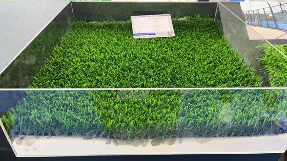 Grama artificial não revestida com estofado absorvente de choques para campos desportivos